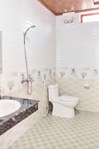 Et badeværelse på Cosiana Homestay + 72 billeder