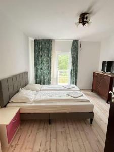 Ένα ή περισσότερα κρεβάτια σε δωμάτιο στο Hotel Breitenbenden