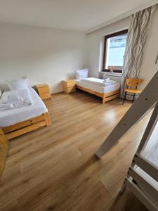 Ένα ή περισσότερα κρεβάτια σε δωμάτιο στο W45 Dornbirn Hills