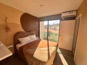 Ένα ή περισσότερα κρεβάτια σε δωμάτιο στο Sunkissed Haven