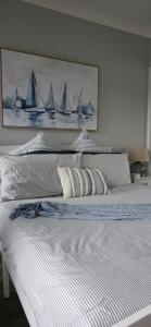 Ένα ή περισσότερα κρεβάτια σε δωμάτιο στο Silver's House