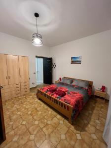 En eller flere senge i et værelse på Vicol8 Casa Vacanze Dorgali