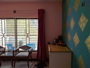 a dining room with a table and a dining roomiasm at Sultan Resorts 7 star Luxurious accommodations 