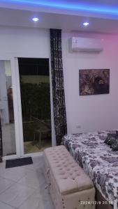 Ένα ή περισσότερα κρεβάτια σε δωμάτιο στο Monolocale 37 mq con giardino