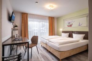 Postel nebo postele na pokoji v ubytování Frühstückspension Lavendel