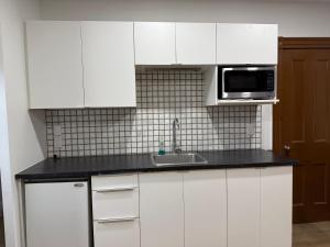 Køkken eller tekøkken på Downtown Residence Room 3