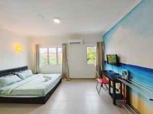 Ένα ή περισσότερα κρεβάτια σε δωμάτιο στο Desaru Black Beach Sky Mirror Resort +92 φωτογραφίες