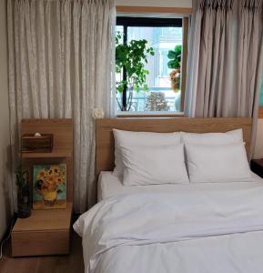 Postel nebo postele na pokoji v ubytování StarryStay