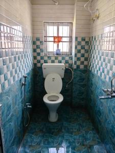 Ένα μπάνιο στο Oakwood HomeStay +8 φωτογραφίες