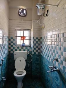 Ένα μπάνιο στο Oakwood HomeStay