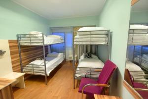 Ένα ή περισσότερα κρεβάτια σε δωμάτιο στο Arkadia Hotelli