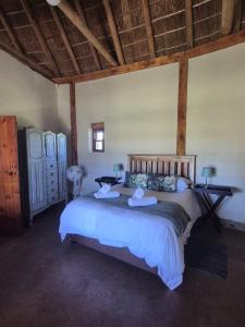 Postel nebo postele na pokoji v ubytování Wagenboom Escape