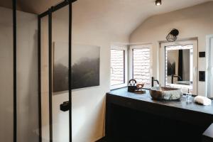 Μια τηλεόραση ή/και κέντρο ψυχαγωγίας στο Lehm & Fachwerk Dach-Apartment - Claycation +5 φωτογραφίες