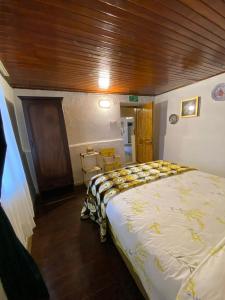 Ένα ή περισσότερα κρεβάτια σε δωμάτιο στο House in Perfect Location