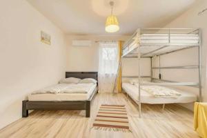 Voodi või voodid majutusasutuse Párty dům toas