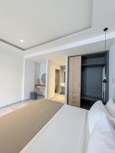 Postel nebo postele na pokoji v ubytování Nirea Studio II