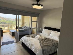 En eller flere senge i et værelse på 92 Laguna La Crete