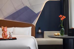 Ένα ή περισσότερα κρεβάτια σε δωμάτιο στο FunGee X +7 φωτογραφίες