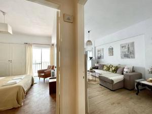 Ένα ή περισσότερα κρεβάτια σε δωμάτιο στο Yvonne Beach Apartment by Refugio