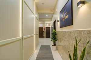 TV/trung tâm giải trí tại FabHotel Grand Stay Ambedkar Nagar