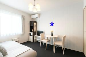 Ένα ή περισσότερα κρεβάτια σε δωμάτιο στο 夢富良野