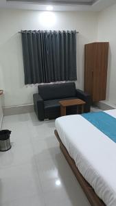 Postel nebo postele na pokoji v ubytování Hotel Empire