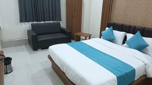 Postel nebo postele na pokoji v ubytování Hotel Empire