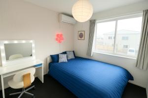 Ένα ή περισσότερα κρεβάτια σε δωμάτιο στο 夢富良野