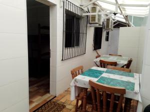 Galería fotográfica de Home Enseada Beach en Guarujá