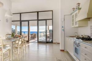 Η κουζίνα ή μικρή κουζίνα στο La Dimora del Marinaio - HelloElba +21 φωτογραφίες