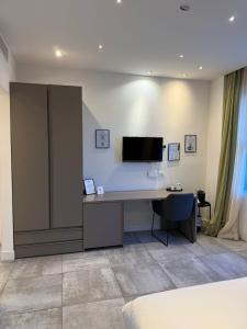 Μια τηλεόραση ή/και κέντρο ψυχαγωγίας στο Mazzini Suites