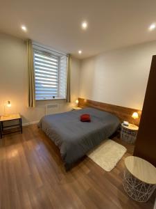Ένα ή περισσότερα κρεβάτια σε δωμάτιο στο Appartement moderne et cosy - Le Refuge du Bonhomme