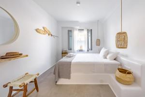 Postel nebo postele na pokoji v ubytování Relaxia Estate Naxos By KB Hospitality