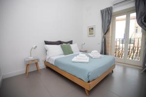 Ένα ή περισσότερα κρεβάτια σε δωμάτιο στο Casa Cadur