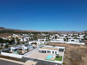 an aerial view of a town with white buildings at Villa Mare in Teguise