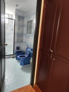 Χώρος καθιστικού στο Casa Lili - Hospedaje en Cali