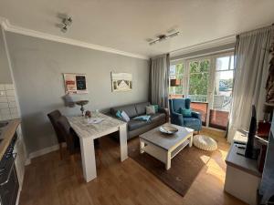 Posezení v ubytování Haus Jahreszeiten Appartement Meeresrauscher by Unsere Urlaubszeit