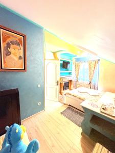 Ένα ή περισσότερα κρεβάτια σε δωμάτιο στο Presidential Apartment