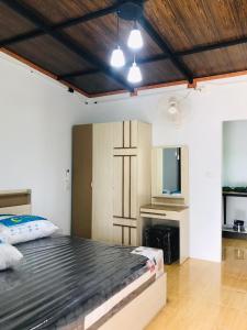 Postel nebo postele na pokoji v ubytování Abu Sea Man House