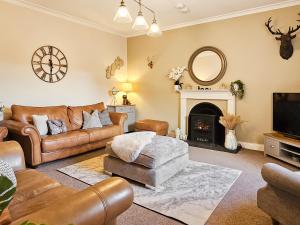 Телевизор и/или развлекательный центр в Antfield House