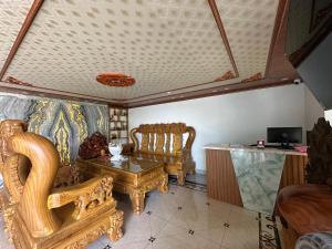 TV a/nebo společenská místnost v ubytování Homestay Thế Anh + 6 fotografií