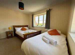 Ένα ή περισσότερα κρεβάτια σε δωμάτιο στο Gt. Marlow TownHouse- Families, Pets & Contractors +11 φωτογραφίες