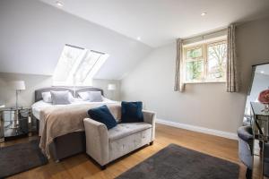 En eller flere senge i et værelse på Swallows Lodge