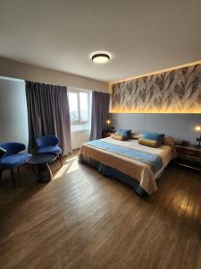 Giường trong phòng chung tại Hotel Continental