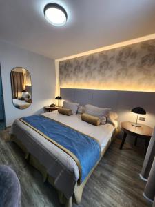 Ένα ή περισσότερα κρεβάτια σε δωμάτιο στο Hotel Continental