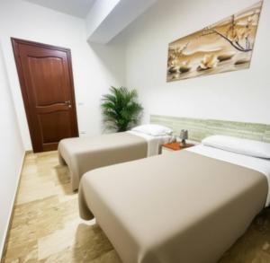 Ένα ή περισσότερα κρεβάτια σε δωμάτιο στο Charming Avezzano Apartment for Family Getaways