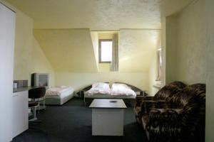 Кровать или кровати в номере Хотел Роджърс +2 фотографии