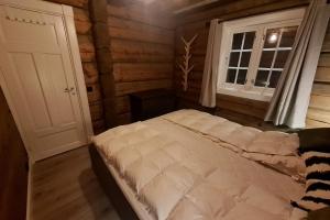 Ένα ή περισσότερα κρεβάτια σε δωμάτιο στο Luster Lodge +52 φωτογραφίες