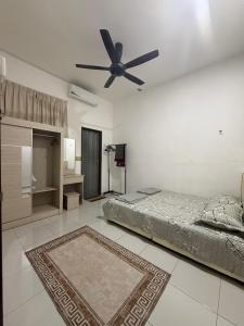 Postel nebo postele na pokoji v ubytování Inaz Homestay Alor Setar + 9 fotografií