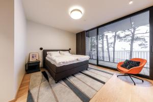 Ένα ή περισσότερα κρεβάτια σε δωμάτιο στο Reute Residentsid +246 φωτογραφίες